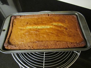 Baked cake cooling on rack