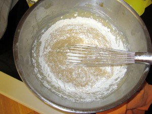 Mixing honey cake ingredients